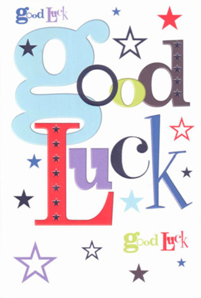 In this photograph, a modern good luck card is shown in close detail, its design bursting with character yet anchored by a clean white background. The central focus is the phrase Good Luck, written in an eclectic mix of typefaces that seem to chat with each other across the card. A broad, baby-blue g feels soft and welcoming, followed by narrower, upright letters in charcoal black that lend a hint of seriousness, then exuberant shapes in bright red, mossy green and deep violet that lift the mood back into playful territory. Each letter carries its own personality, much like the varied blooms in a mixed bouquet created for a celebration in Abbots Langley. Around the wording, clusters of stars in different sizes and shades sweep across the card as though caught in a gentle breeze. Some stars are bold and saturated-navy, indigo and royal purple-while others appear in paler tones of sky-blue, lilac and lemon-lime, fading softly at the edges like early evening skies over fields beyond the village. The stars don't form a rigid pattern; instead, they meander in loose trails, giving a sense of spontaneity and open possibility. The card stock looks sturdy and smooth, with crisp cut edges and a matte finish that would feel pleasantly firm when you hold it, the printing sitting flat but visually lively. Light falls evenly, avoiding harsh glare, so every colour reads clearly. The overall impression is one of bright, friendly encouragement-the sort of card you'd slip alongside a hand-tied arrangement for exam success at nearby schools or a house-warming off Breakspeare Road-quietly promising that luck, support and a sprinkle of magic are all close at hand.